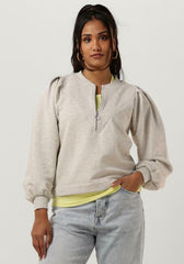 Zipped neck puffed sleeved sweater