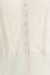 HIGH COLLAR BUTTON CLOSURE
