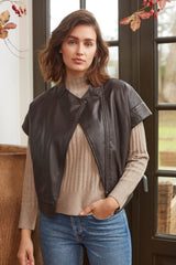 Faux leather sleeveless jacket with a padded lining